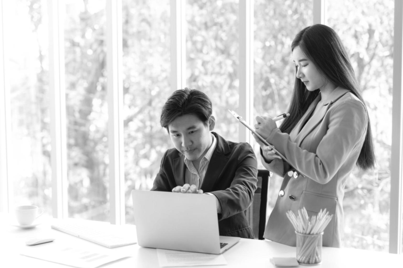 Financial planning and analysis workspace with charts and documents